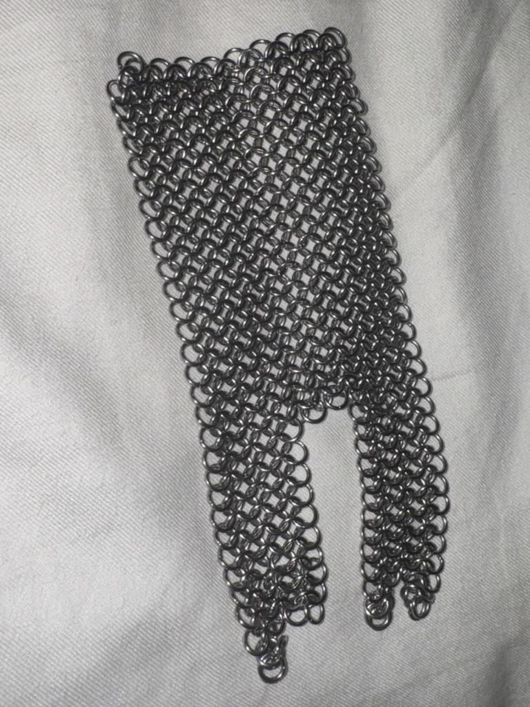 Steel Kloth bracelets worn while resting hands on sunlit granite