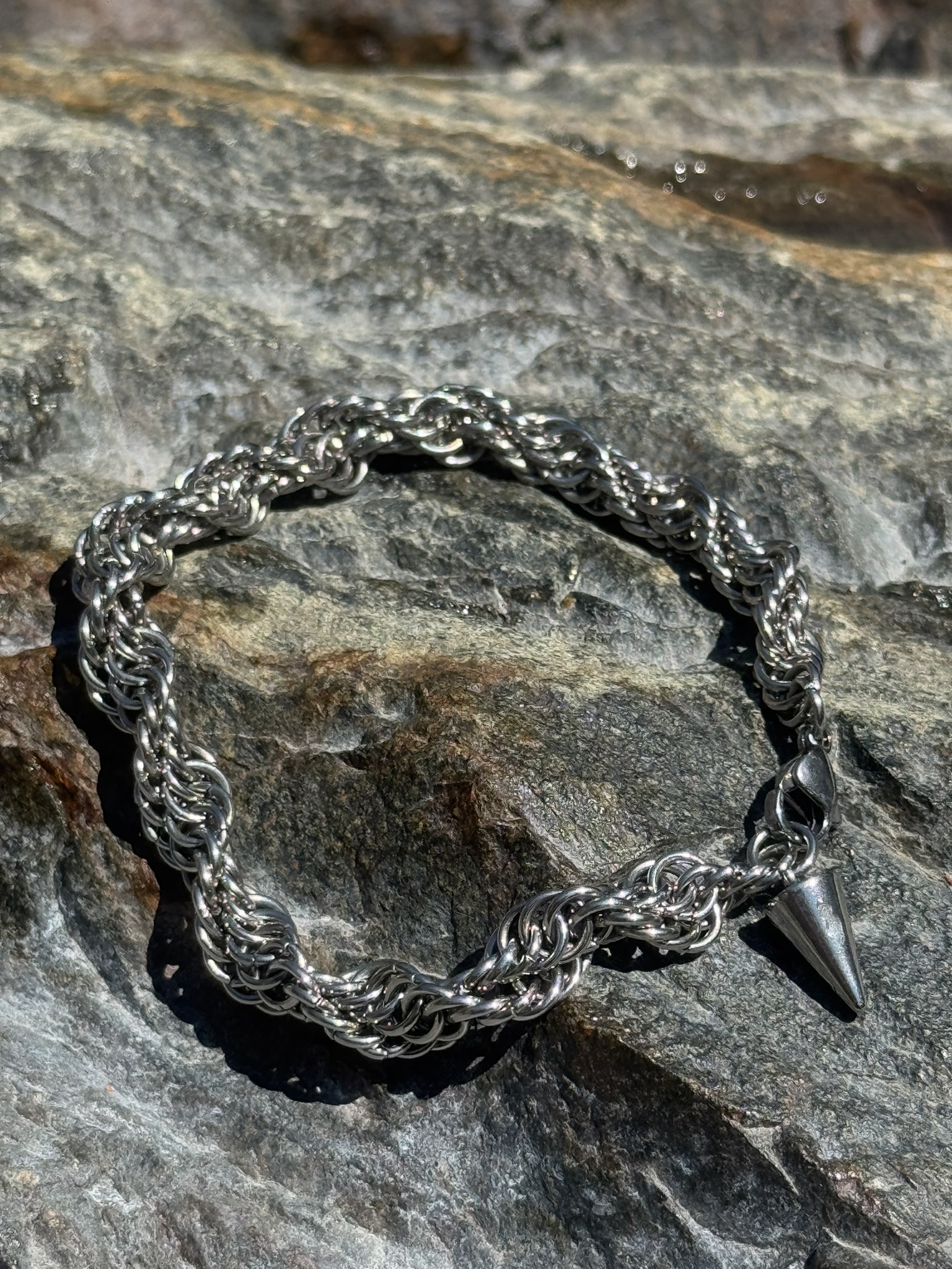 Handwoven stainless steel maille in the studio